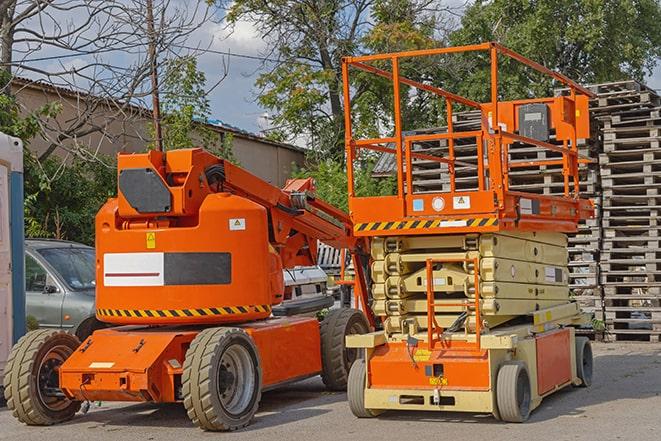 warehouse forklift handling large cargo in Chesaning MI