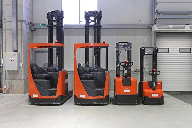 warehouse forklifts ready for loading